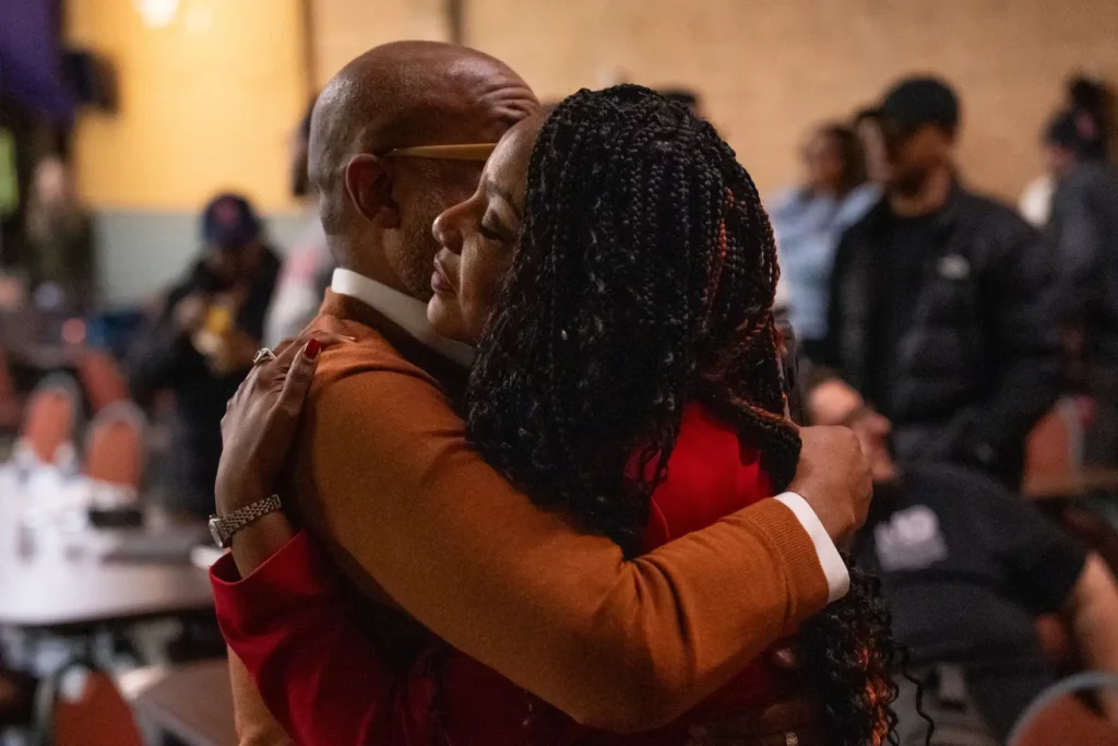 St. Louis Mayor Tishaura Jones hugs supporter Vincent Flewellen after 8th Ward Alderwoman Cara Jones defeated her in the mayoral