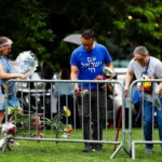 Placing flowers on Monday to honor the victims, at the attack site, a pedestrian downtown street filled with restaurants and shops. American Jews